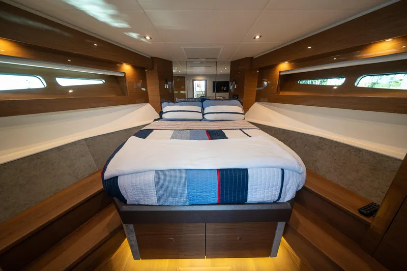Slide: The Image of Luxurious 2019 Cruisers Yachts Cantius bedroom interior with modern design and cozy bedding. - 32