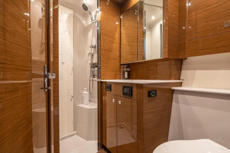 Slide: The Image of Luxurious 2019 Cruisers Yachts Cantius bathroom with wood finish and modern fixtures. - 34