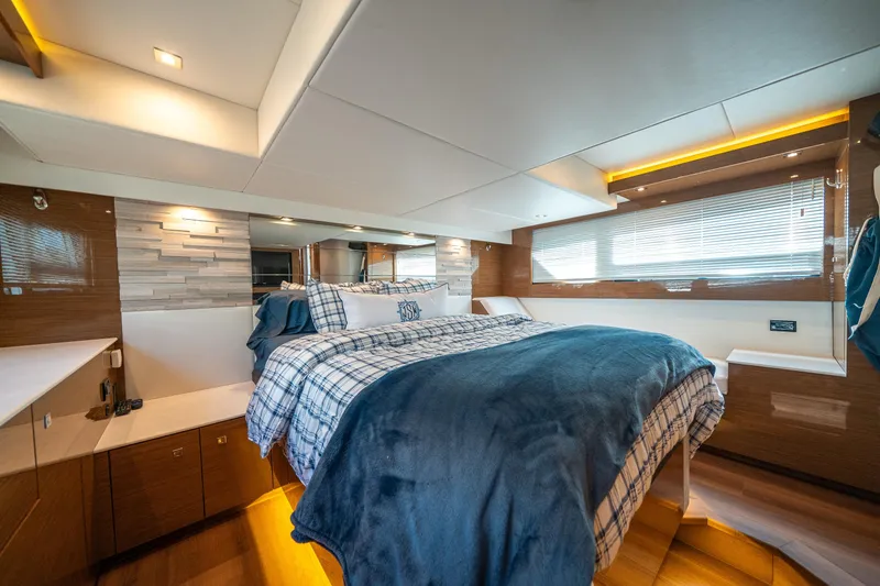 Slide: The Image of Luxurious 2019 Cruisers Yachts Cantius bedroom with modern decor and cozy bedding. - 40