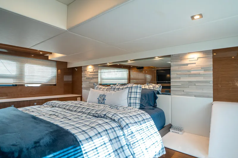 Slide: The Image of Luxurious bedroom interior of 2019 Cruisers Yachts Cantius with modern decor and cozy bedding. - 43