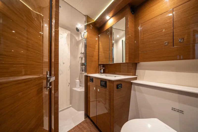 Slide: The Image of Luxurious 2019 Cruisers Yachts Cantius bathroom with wood finish and modern amenities. - 45