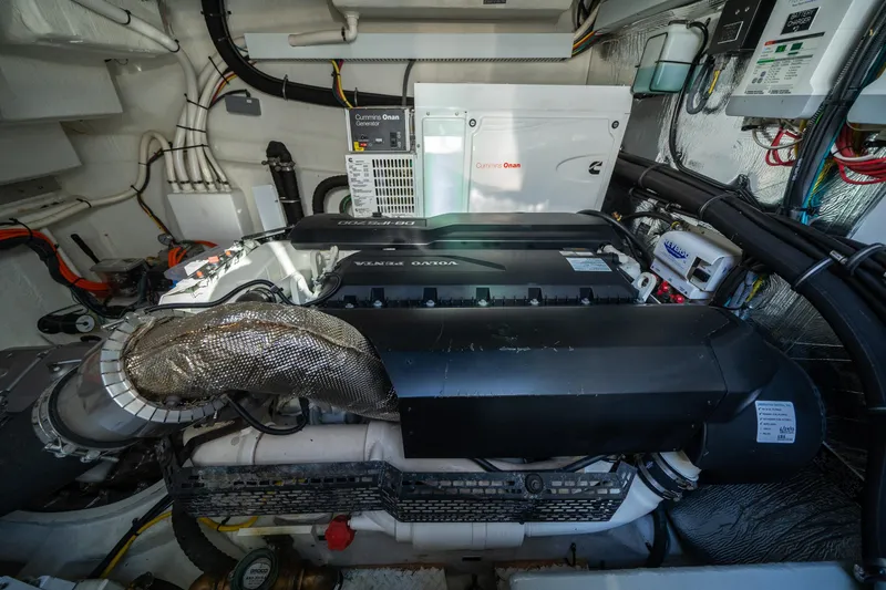 Slide: The Image of Engine room of 2019 Cruisers Yachts Cantius with Cummins Onan generator and Volvo Penta engine. - 50
