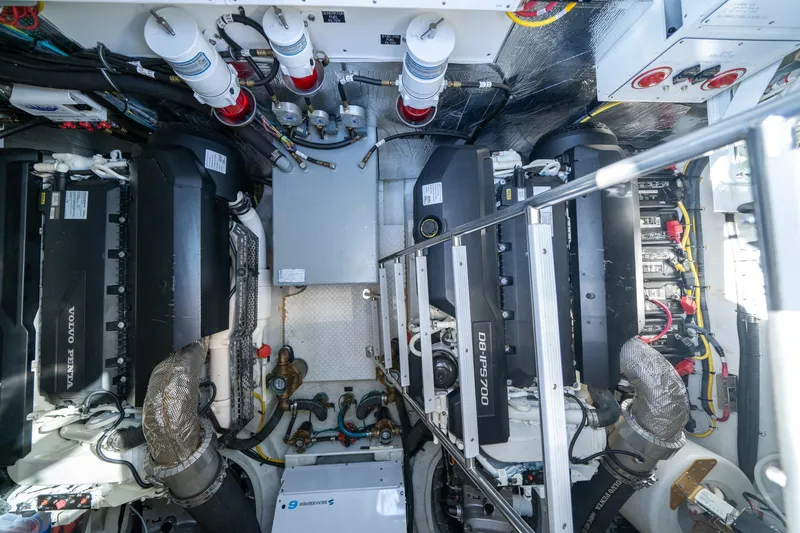 Slide: The Image of Engine room of 2019 Cruisers Yachts Cantius with Volvo Penta engines and advanced systems. - 54