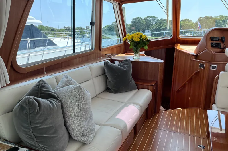 Slide: The Image of Interior of 2022 Sabre 48 Salon Express yacht with steering wheel and control panel. - 17