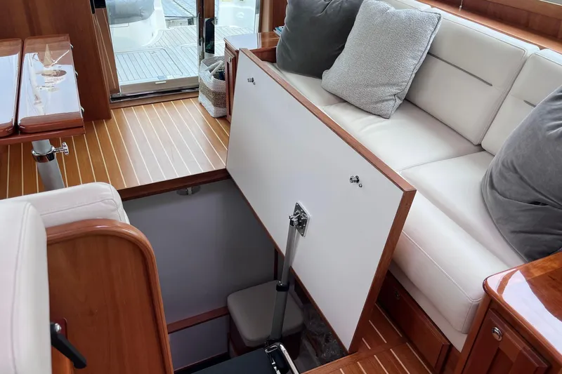 Slide: The Image of Luxurious wooden interior of 2022 Sabre 48 Salon Express yacht kitchen. - 20