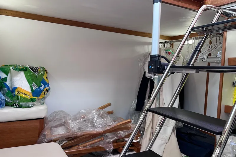 Slide: The Image of Luxurious cabin interior of 2022 Sabre 48 Salon Express yacht with elegant wood finish. - 21