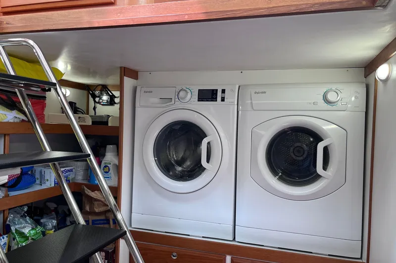 Slide: The Image of Luxurious interior of 2022 Sabre 48 Salon Express yacht with wood finish and modern amenities. - 23