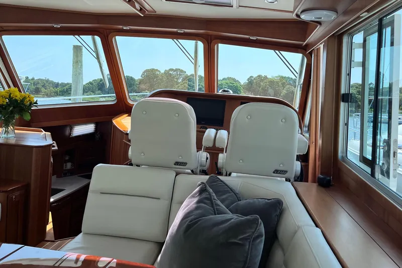 Slide: The Image of Luxurious interior of 2022 Sabre 48 Salon Express yacht with wood paneling and modern amenities. - 24