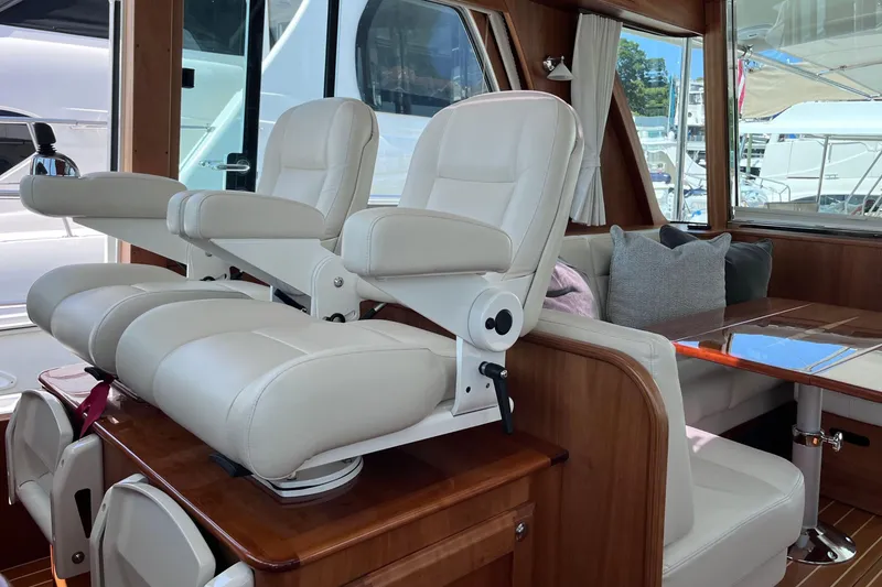 Slide: The Image of Modern shower interior in 2022 Sabre 48 Salon Express yacht, featuring glass and wood accents. - 26