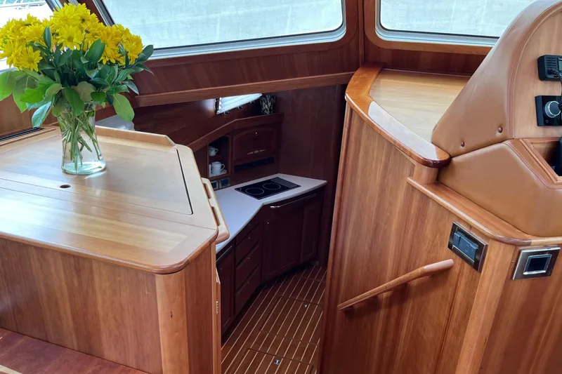 Slide: The Image of Luxurious bathroom sink in 2022 Sabre 48 Salon Express yacht, featuring elegant wood finish. - 29