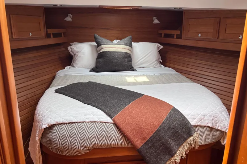 Slide: The Image of Laundry area in 2022 Sabre 48 Salon Express yacht with washer and dryer. - 36