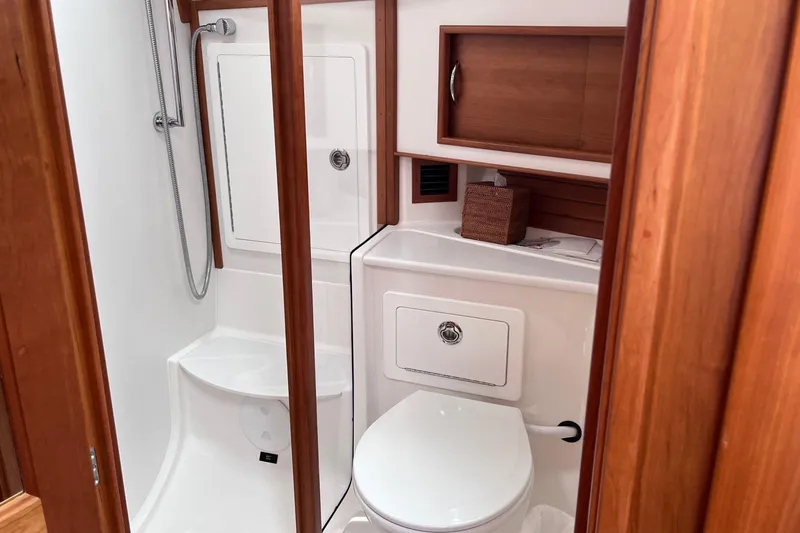 Slide: The Image of Interior of 2022 Sabre 48 Salon Express yacht with elegant seating and wooden finishes. - 40