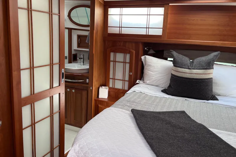 Slide: The Image of Luxurious interior of 2022 Sabre 48 Salon Express yacht with plush seating and scenic view. - 42