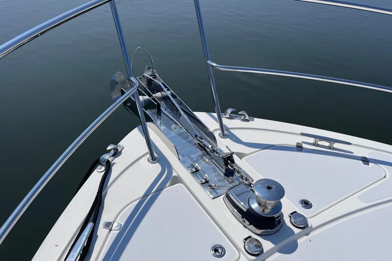 Slide: The Image of Engine room of 2022 Sabre 48 Salon Express with visible wiring and components. - 49