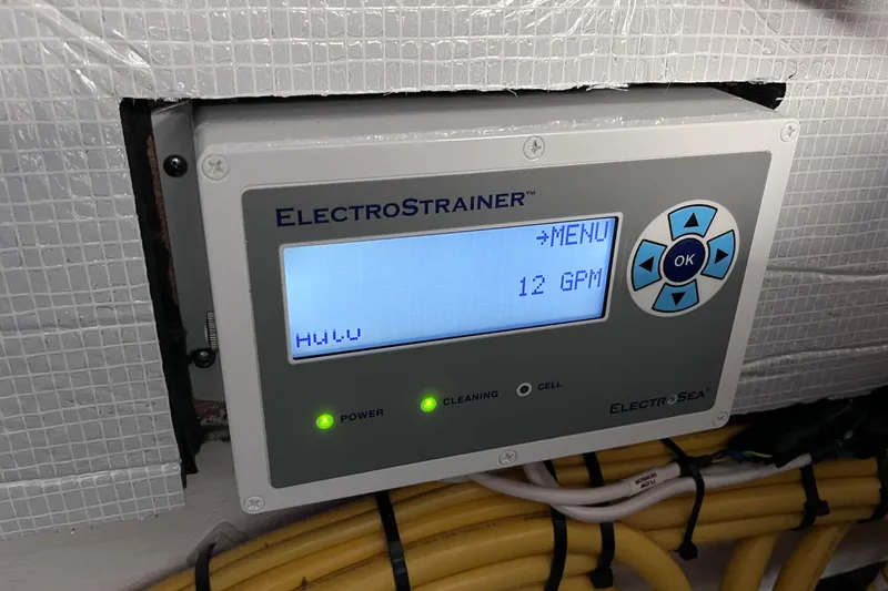 Slide: The Image of 2022 Sabre 48 Salon Express cruising on open water, aerial view. - 58