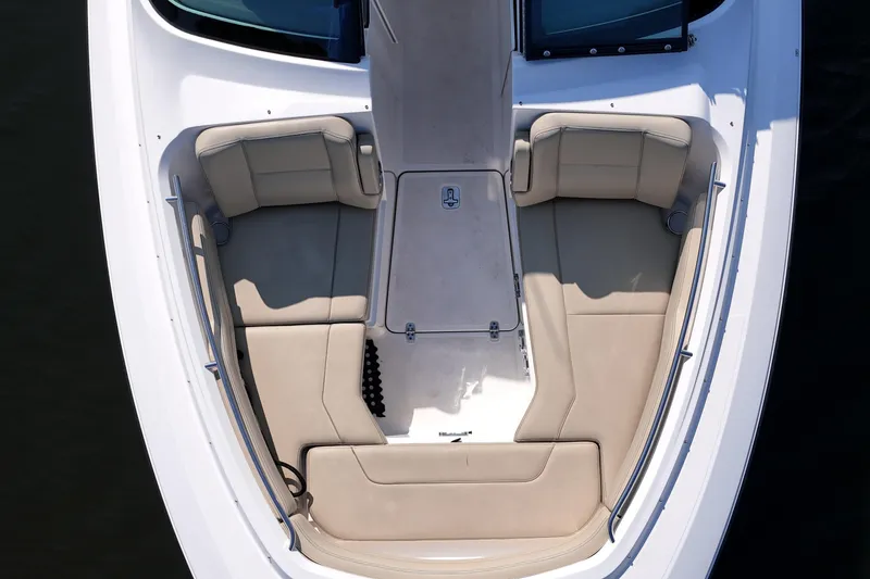 Slide: The Image of 2018 Pursuit DC 295 Dual Console boat with spacious seating and sleek design. - 12