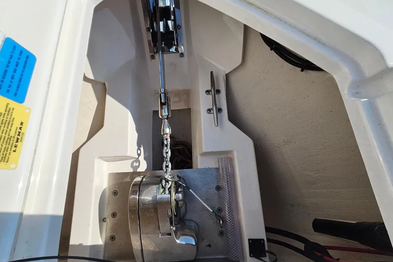 Slide: The Image of Anchor chain mechanism on a 2018 Pursuit DC 295 Dual Console boat. - 41