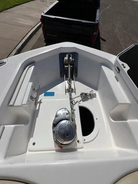 Slide: The Image of 2018 Sea Fox 248 Commander boat anchor compartment with winch and storage. - 16