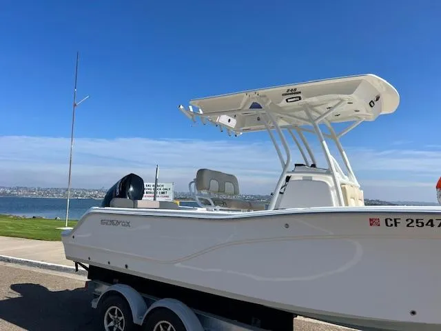 Slide: The Image of 2018 Sea Fox 248 Commander boat on trailer by the waterfront. - 21