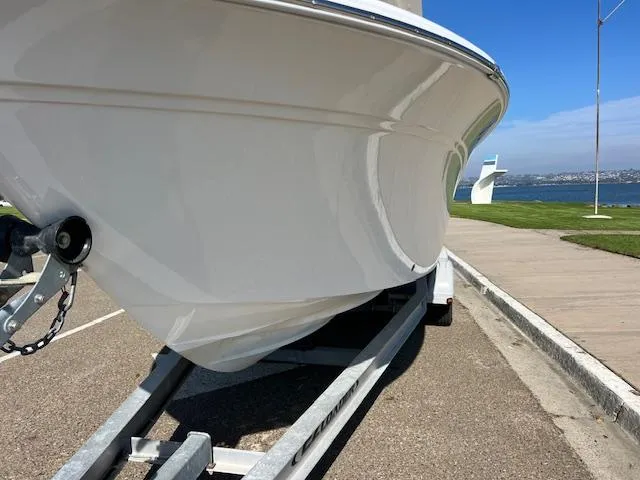 Slide: The Image of 2018 Sea Fox 248 Commander boat on trailer by waterfront. - 4