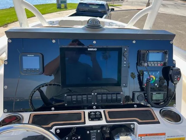 Slide: The Image of Control panel of a 2018 Sea Fox 248 Commander boat with navigation and communication equipment. - 6