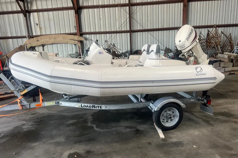 Slide: The Image of 2021 Zodiac Yachtline 360 inflatable boat on trailer in storage facility. - 4