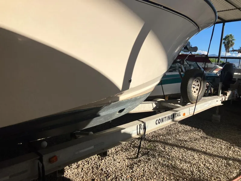 Slide: The Image of 2006 Grady-White Bimini 306 boat on Continental trailer in storage. - 17