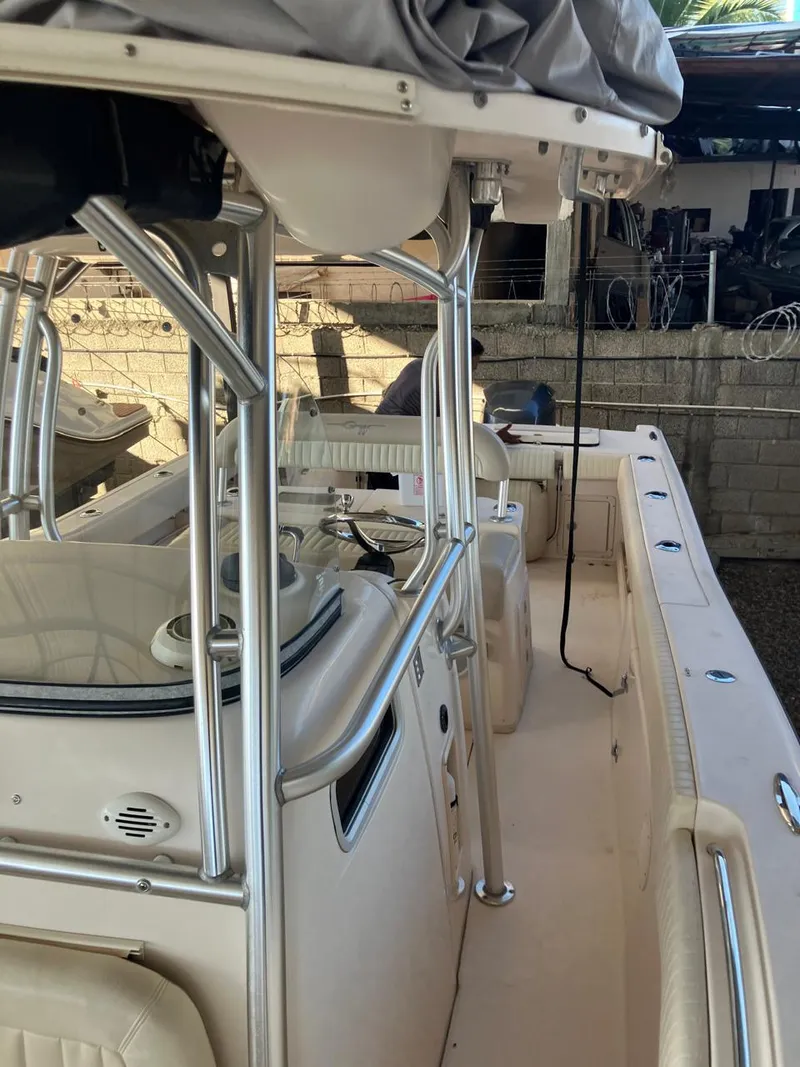 Slide: The Image of 2006 Grady-White Bimini 306 boat interior with stainless steel railings. - 21
