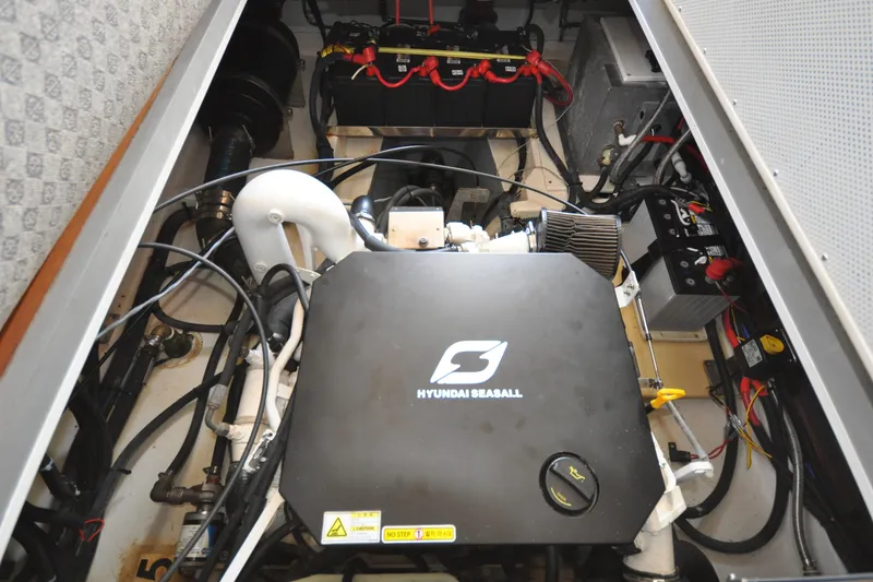 Slide: The Image of Engine compartment of 2015 Helmsman Trawlers 31 Sedan with Hyundai SeasAll engine. - 40