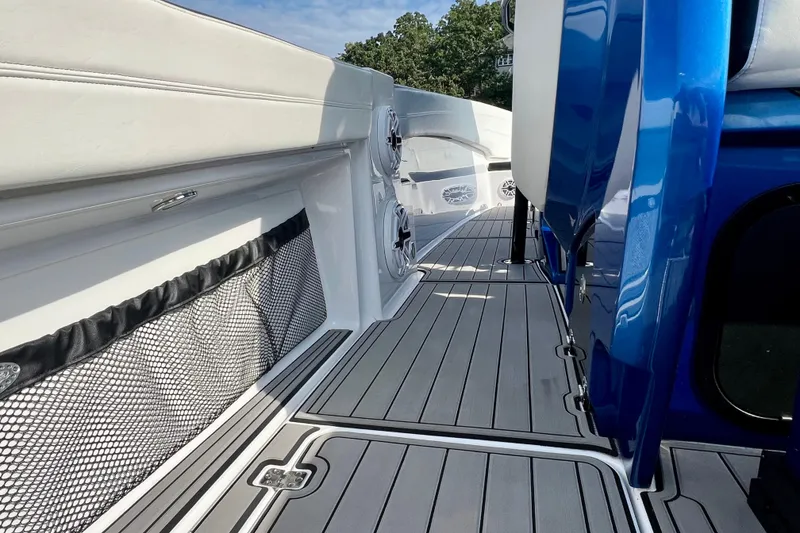 Slide: The Image of 2020 Nor-Tech 340 Sport Center Console boat interior with sleek design and modern features. - 13