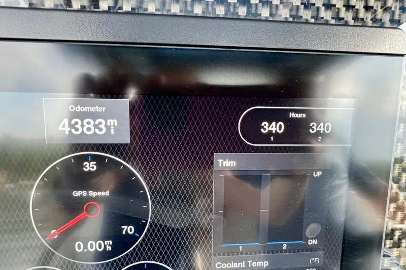 Slide: The Image of Dashboard of 2020 Nor-Tech 340 Sport Center Console showing odometer and GPS speed. - 18