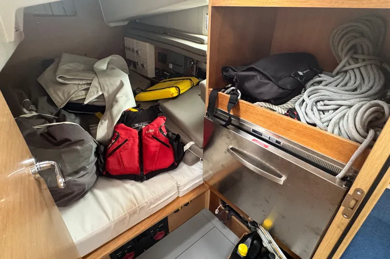 Slide: The Image of Interior of 2020 Jeanneau Sun Odyssey 410 with sailing gear and ropes. - 12