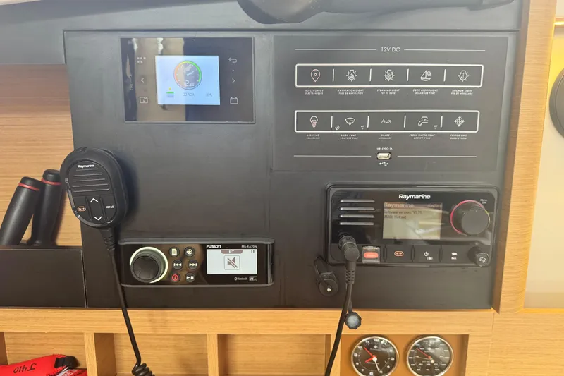 Slide: The Image of Control panel of 2020 Jeanneau Sun Odyssey 410 yacht with navigation and communication systems. - 21