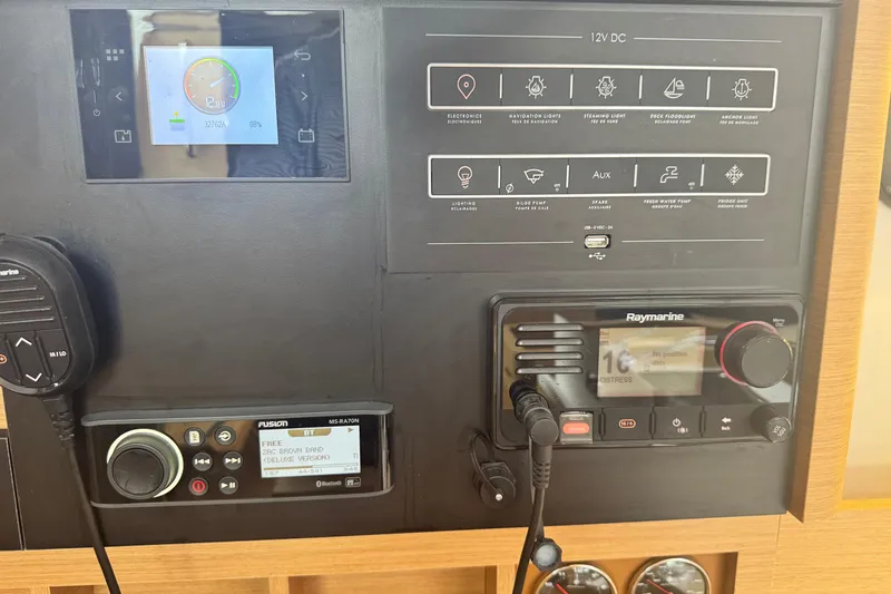 Slide: The Image of Control panel of 2020 Jeanneau Sun Odyssey 410 sailboat with navigation and communication systems. - 23