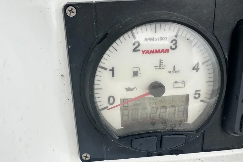 Slide: The Image of Yanmar tachometer on 2020 Jeanneau Sun Odyssey 410 sailboat dashboard. - 28
