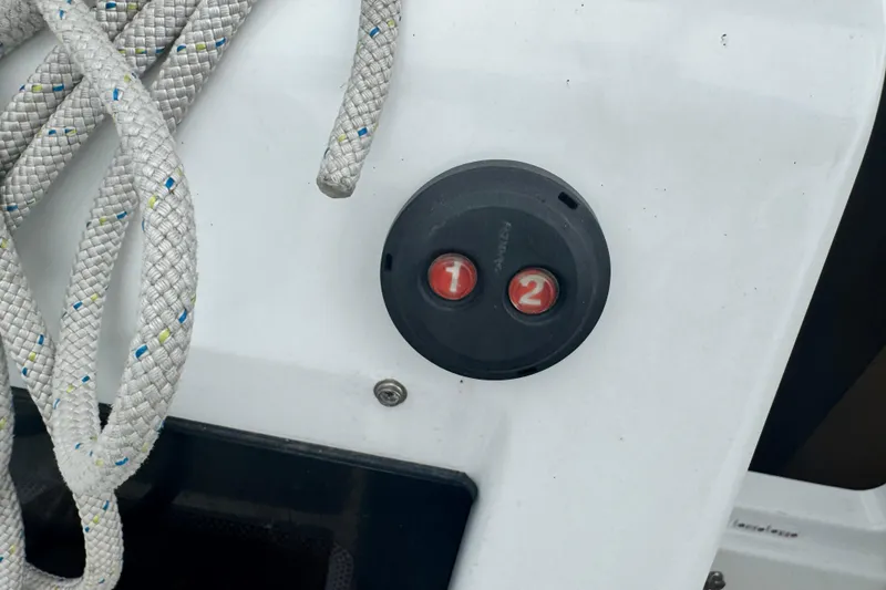 Slide: The Image of Close-up of Jeanneau Sun Odyssey 410 sailboat deck with ropes and control panel. - 8