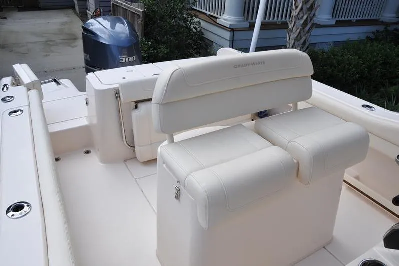 Slide: The Image of 2021 Grady-White Fisherman 236 boat interior with seating and Yamaha 300 engine. - 16