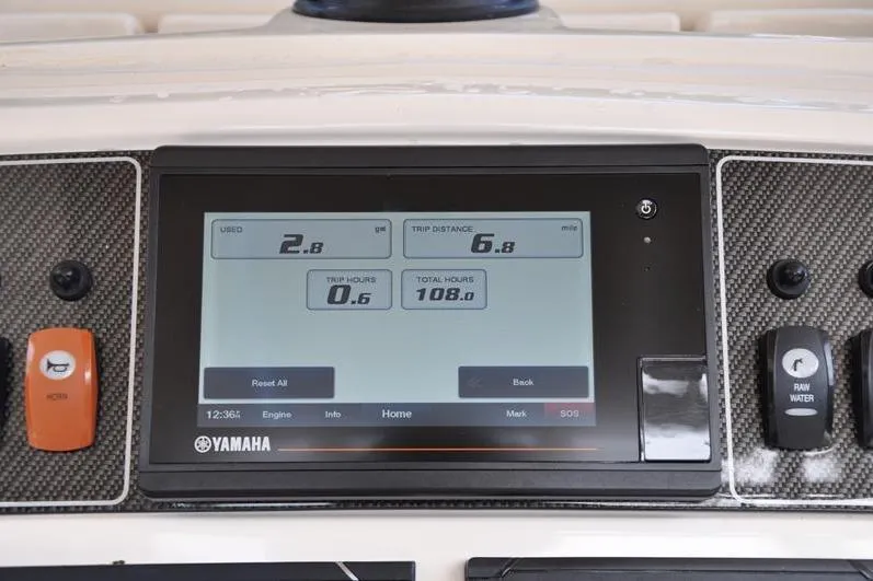 Slide: The Image of Yamaha display on 2021 Grady-White Fisherman 236 boat dashboard showing trip data. - 20