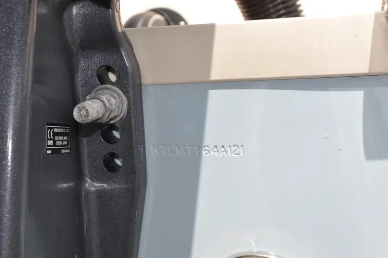 Slide: The Image of 2021 Grady-White Fisherman 236 boat hull identification number and mounting details. - 39