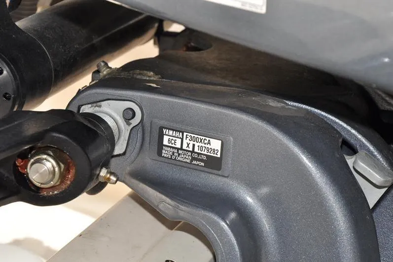 Slide: The Image of Close-up of Yamaha F300XCA engine part on 2021 Grady-White Fisherman 236 boat. - 40