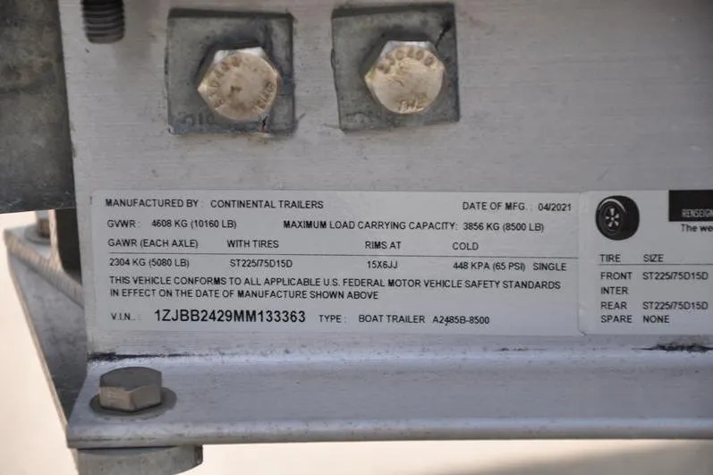 Slide: The Image of Trailer label showing specifications and compliance details for a 2021 Grady-White Fisherman 236. - 41