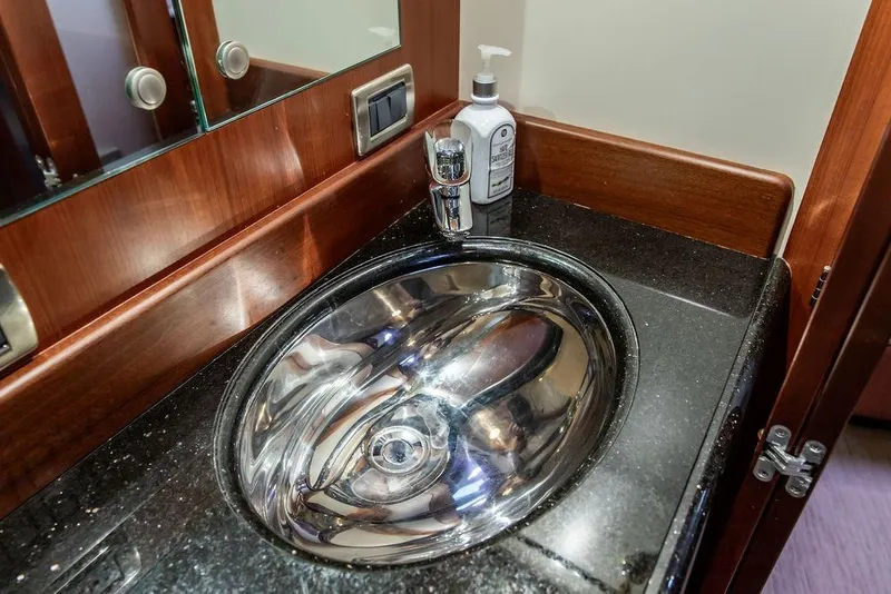 Slide: The Image of Luxurious bathroom sink in 2008 Huckins Linwood yacht with sleek design and modern fixtures. - 33
