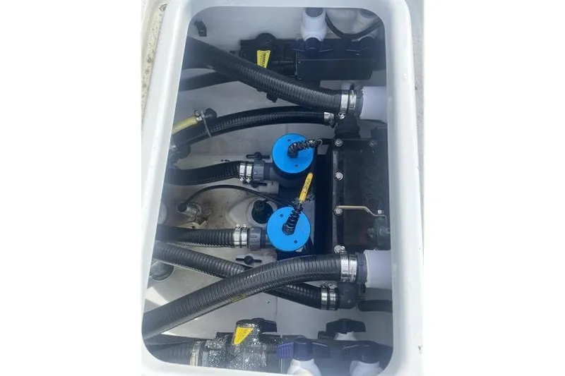 Slide: The Image of 2019 Conch 30 boat interior with gray deck and speaker system. - 11