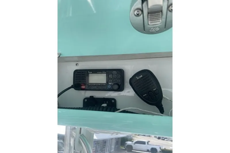 Slide: The Image of Luxurious seating on 2019 Conch 30 boat with diamond-stitched upholstery and cup holders. - 22