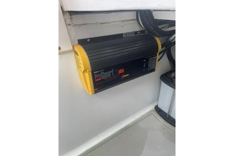 Slide: The Image of Control panel of 2019 Conch 30 boat with audio system and steering wheel. - 31