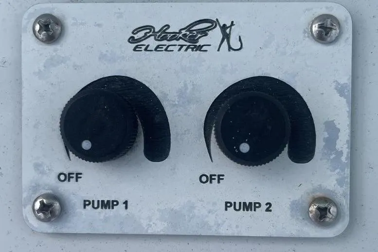 Slide: The Image of Interior of a 2019 Conch 30 boat showing control panel and storage area. - 6