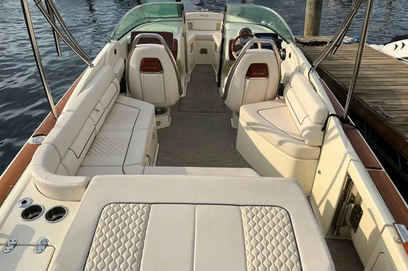 Slide: The Image of 2021 Chris-Craft Launch 25 GT interior with luxurious seating and elegant design. - 4