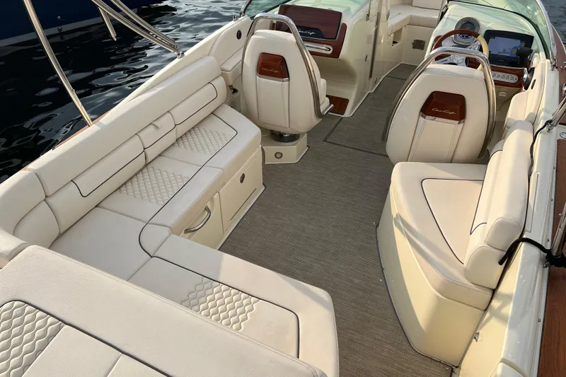 Slide: The Image of 2021 Chris-Craft Launch 25 GT interior with luxurious seating and elegant design. - 6