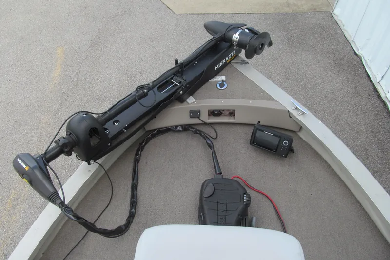Slide: The Image of 1998 Tracker boat with Minn Kota trolling motor and fish finder on deck. - 8
