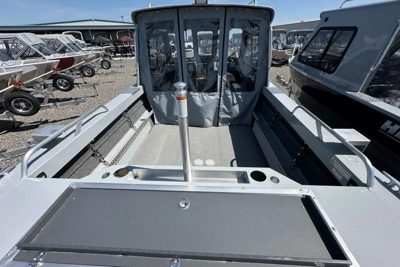 Slide: The Image of 2025 Hewescraft 200 ProV ET HT boat interior with seating and storage compartments. - 5